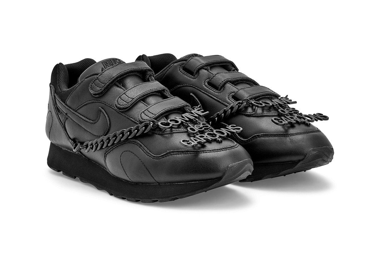 Comme des best sale garcons black nike